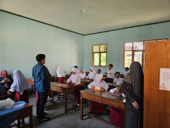 
					Mahasiswa KKN Undip Tim II Gerakan Minat Baca Dengan Cara Merangkum Isi Buku
